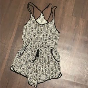 Package of five different rompers S and M.